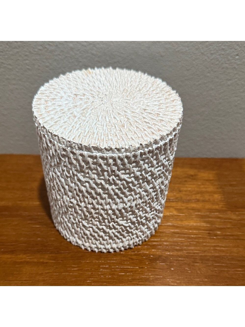 Source Unknown 
White Textured Ceramic Bathroom Canister